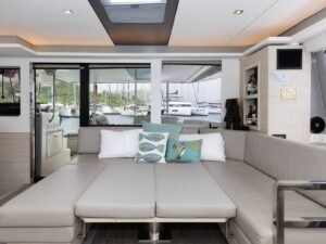 Convertible interior lounge bed inside Leopard 50 VOX catamaran in San Blas