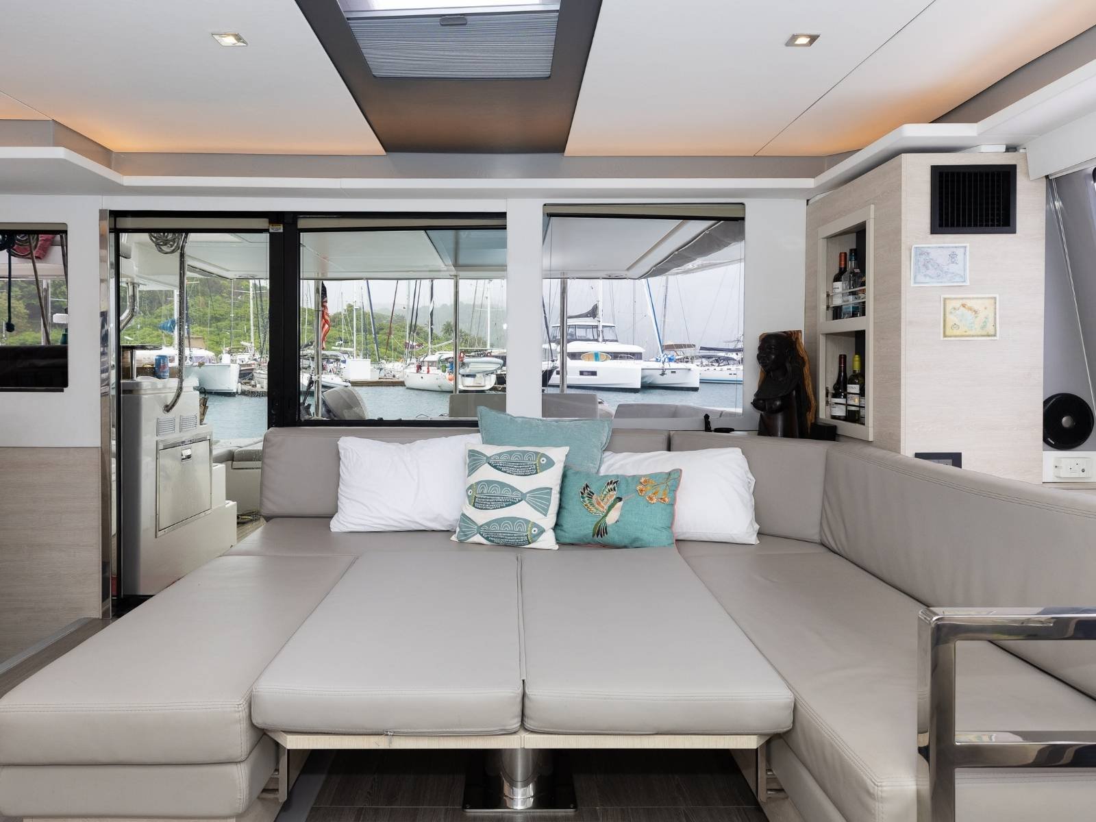 Convertible interior lounge bed inside Leopard 50 VOX catamaran in San Blas