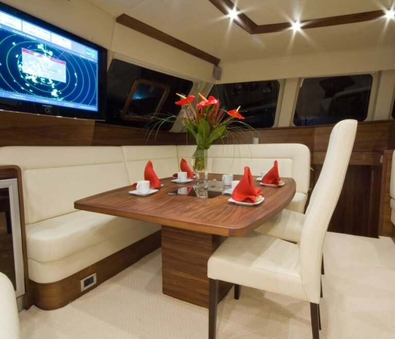 Luxury dining area inside SunReef 62 catamaran in San Blas with elegant table setting