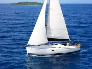 Bavaria 35 sailboat under full sail in the Caribbean waters of San Blas Islands Panama
