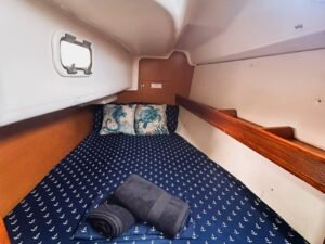 Private cabin interior of Bavaria 35 sailboat in San Blas Islands Panama