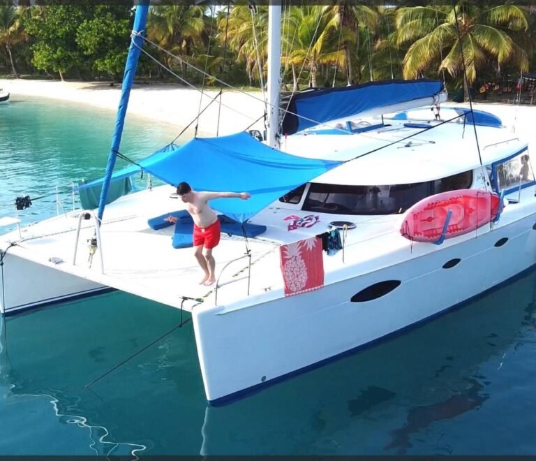 Fontaine Pajot Salinas 48 catamaran anchored at lush tropical island in San Blas Panama