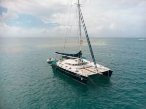 Aerial view of Lagoon 57 catamaran sailing in San Blas Panama