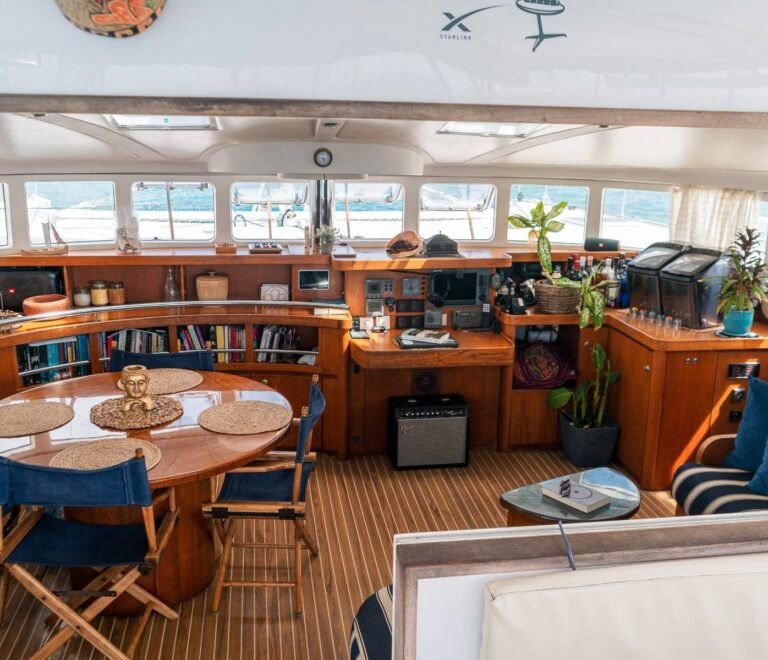 Spacious interior dining and lounge area inside Lagoon 57 catamaran in San Blas