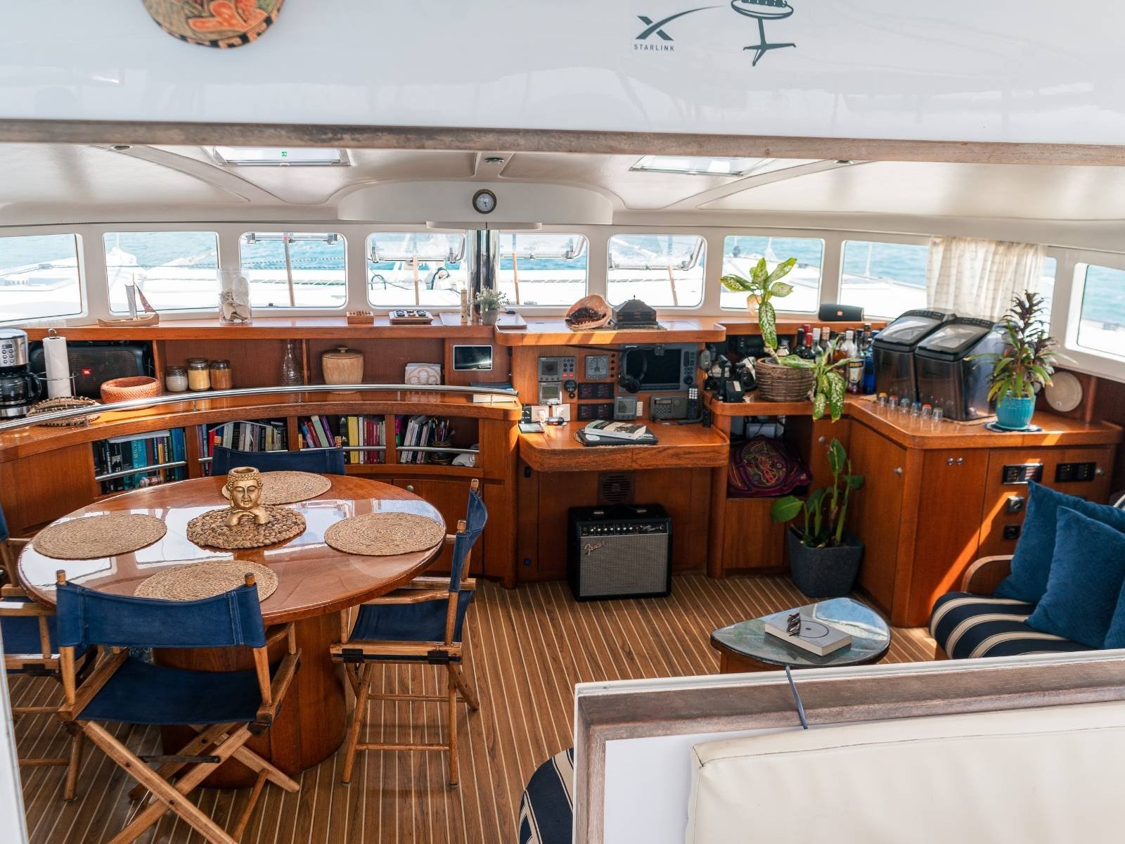 Spacious interior dining and lounge area inside Lagoon 57 catamaran in San Blas