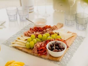 Fresh fruit and charcuterie board served on board catamaran in San Blas Islands Panama