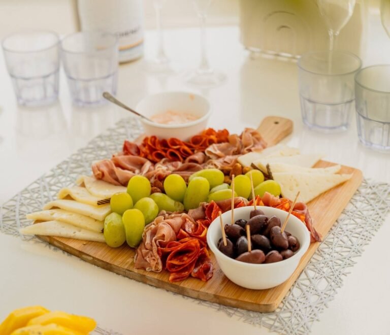 Fresh fruit and charcuterie board served on board catamaran in San Blas Islands Panama