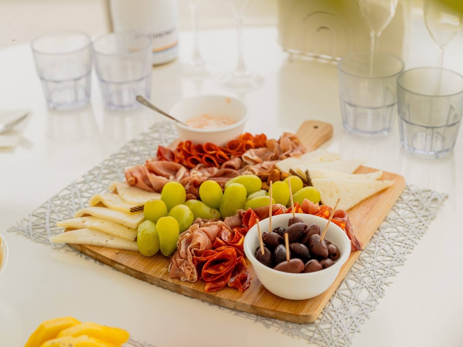 Fresh fruit and charcuterie board served on board catamaran in San Blas Islands Panama
