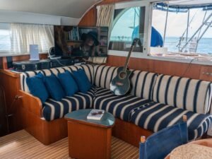 Comfortable indoor lounge seating inside Lagoon 57 catamaran in San Blas