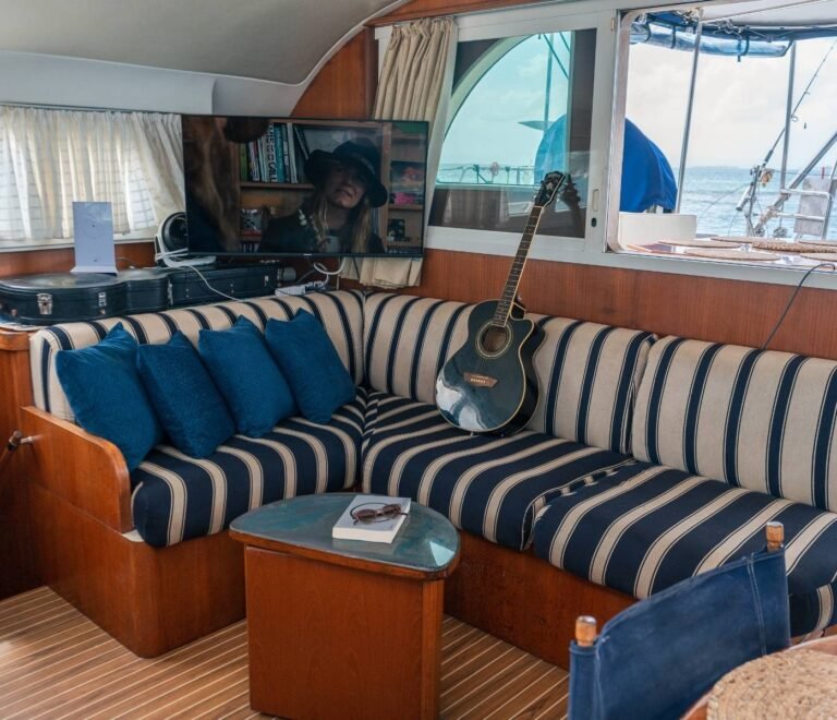 Comfortable indoor lounge seating inside Lagoon 57 catamaran in San Blas