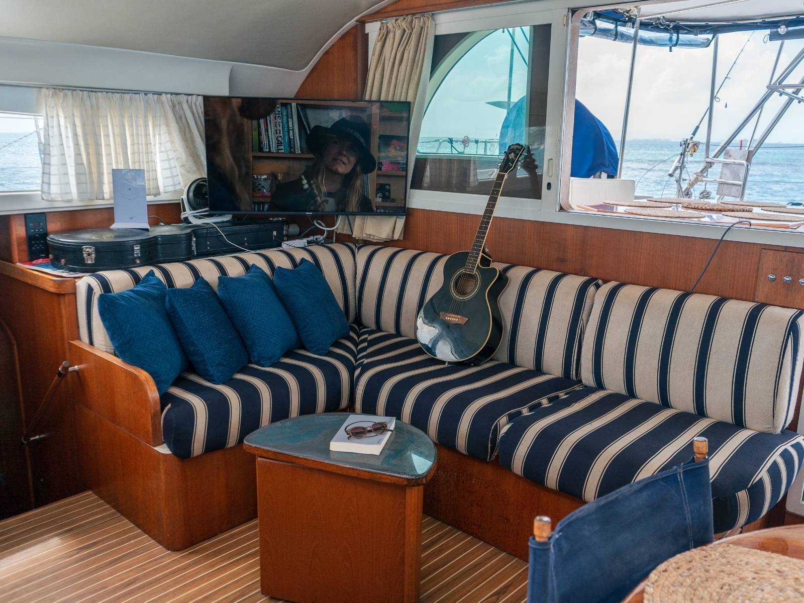 Comfortable indoor lounge seating inside Lagoon 57 catamaran in San Blas