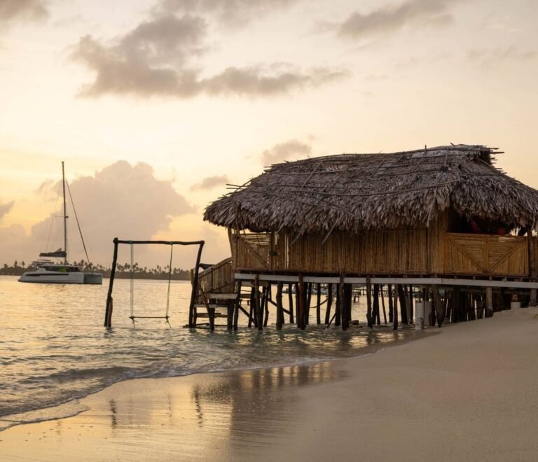 Beachfront bungalow cabin at sunset in Dutch Cays San Blas Panama