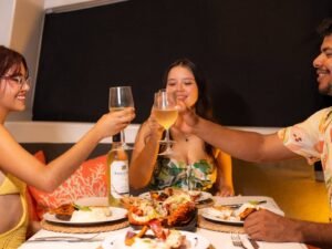 Guests enjoying dinner onboard Lagoon 40 catamaran in San Blas