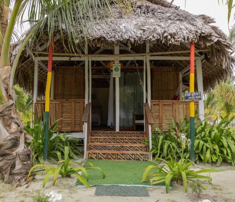 Exterior view of deluxe cabin surrounded by tropical gardens in Dutch Cays San Blas