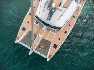 Front nets and sunbathing deck on Ipanema 58 catamaran in San Blas aerial view
