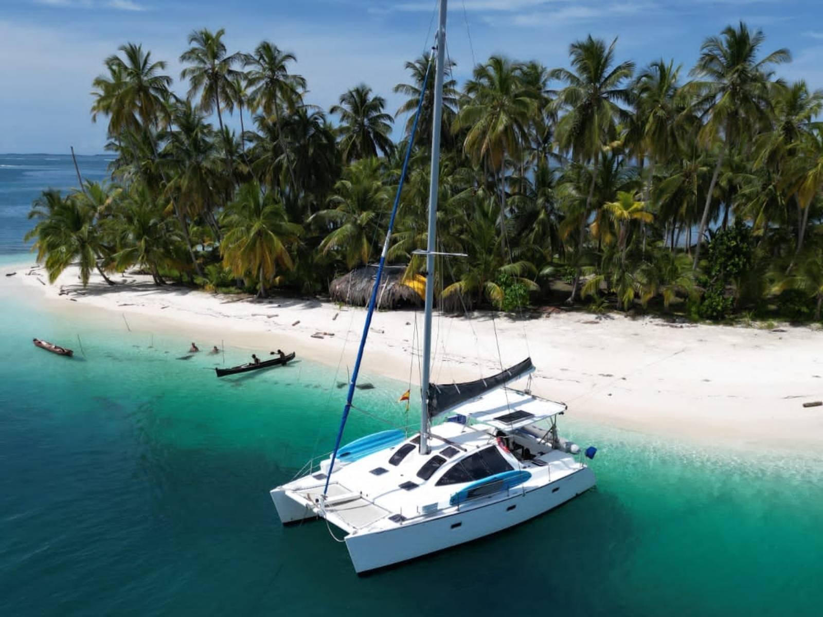 Lagoon 37 catamaran anchored near tropical beach in San Blas Panama