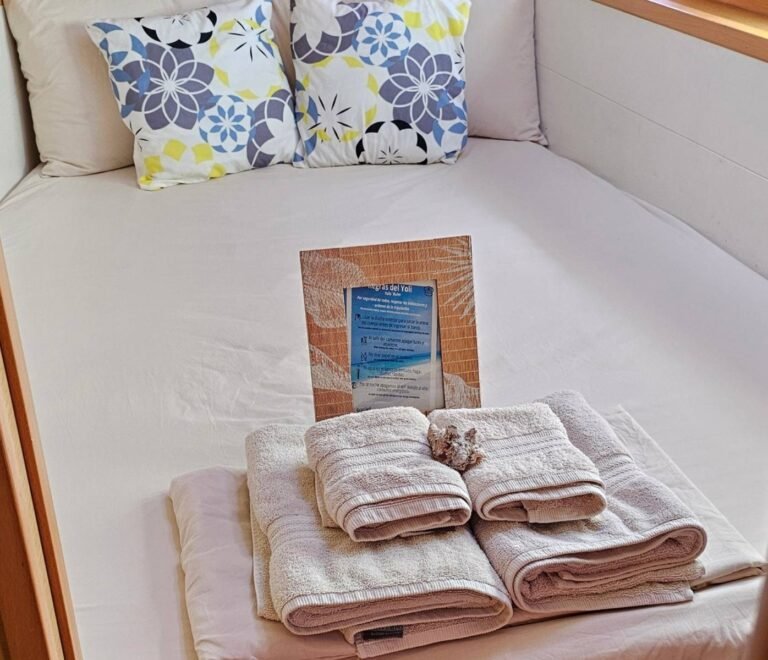 Comfortable guest cabin on Lagoon 40 DO catamaran in San Blas with fresh towels