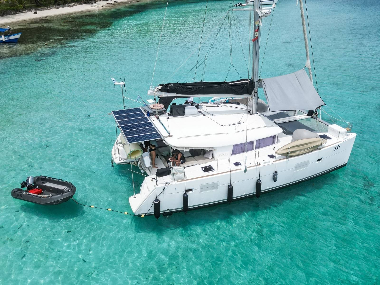 Lagoon 400 DO catamaran anchored in turquoise waters of San Blas aerial view