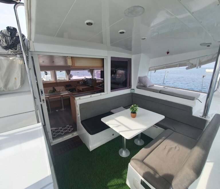 Outdoor cockpit lounge on Lagoon 400 DO catamaran in San Blas with seating area