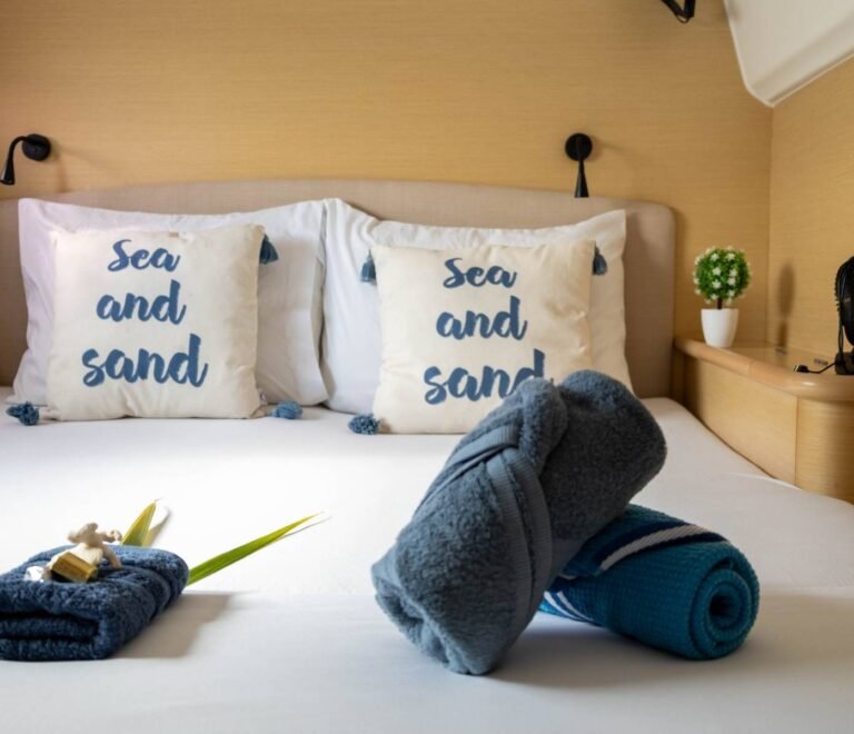 Private cabin detail inside Lagoon 440 catamaran in San Blas with fresh towels