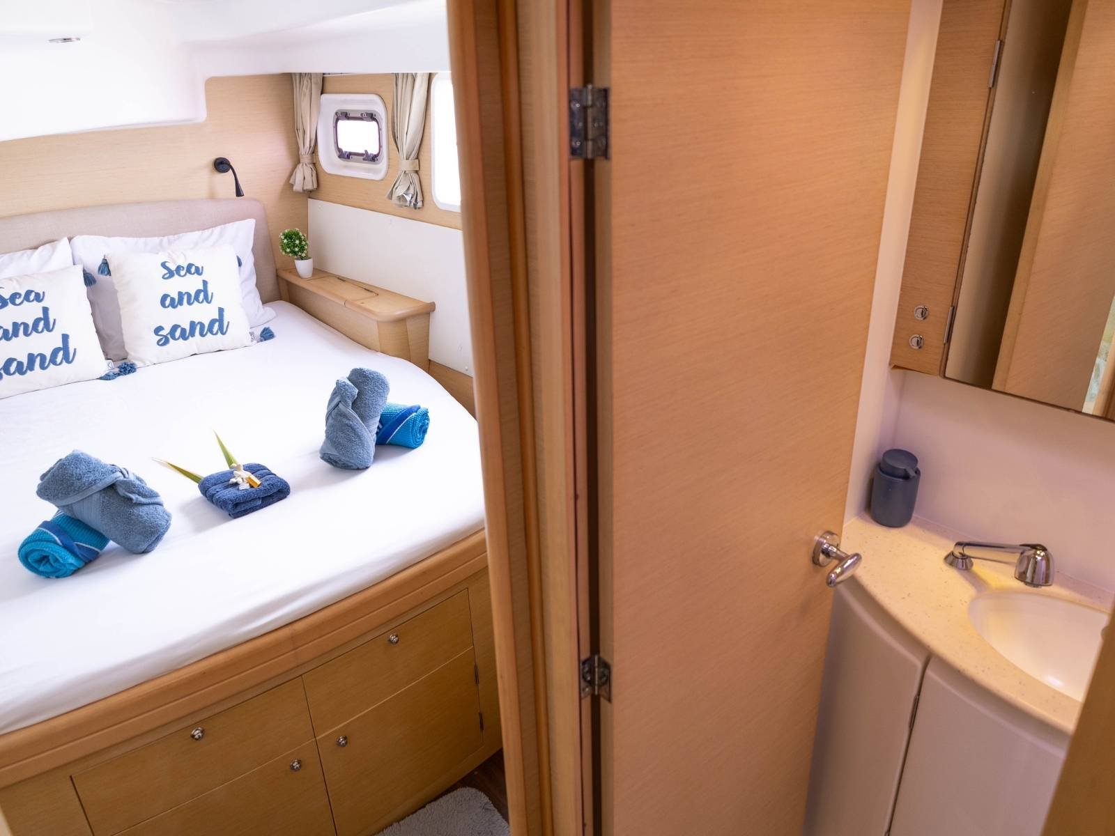 Private cabin and bathroom entrance inside Lagoon 440 catamaran in San Blas
