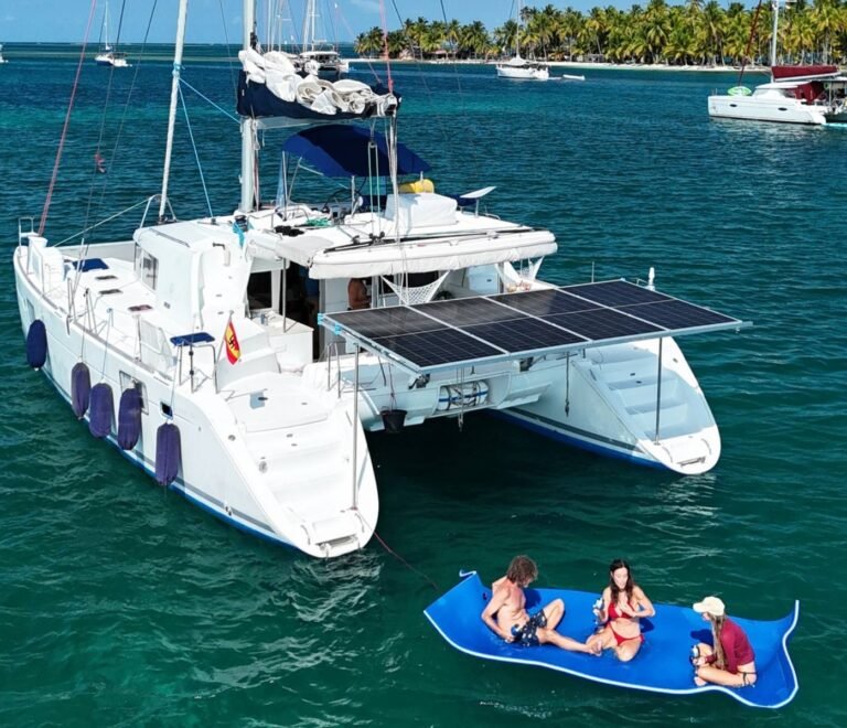 Lagoon 440 catamaran anchored in San Blas with guests enjoying water activities
