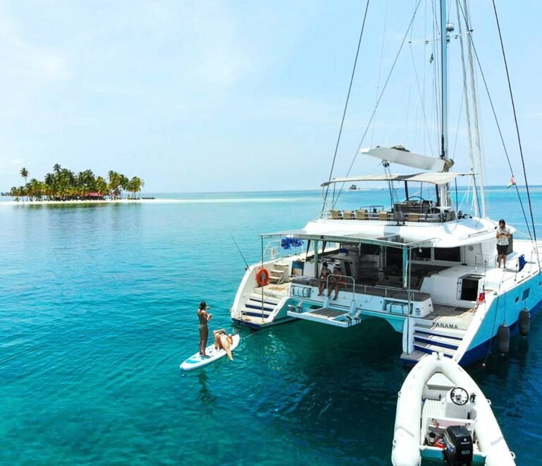 Lagoon 56 catamaran anchored in San Blas with guests enjoying water activities