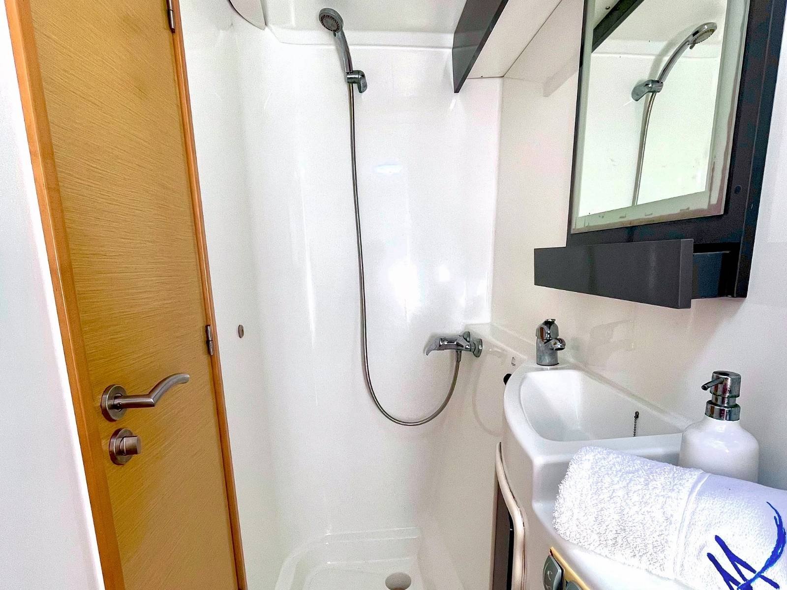 Private bathroom inside Lipari 41 catamaran cabin in San Blas with shower