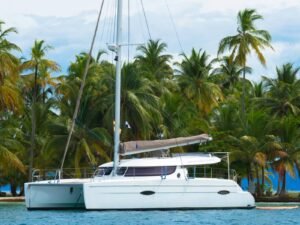 Lipari 41 catamaran anchored near tropical island in San Blas Panama