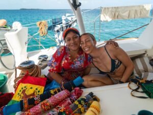 Guests sharing cultural moment with local Guna family during San Blas retreat