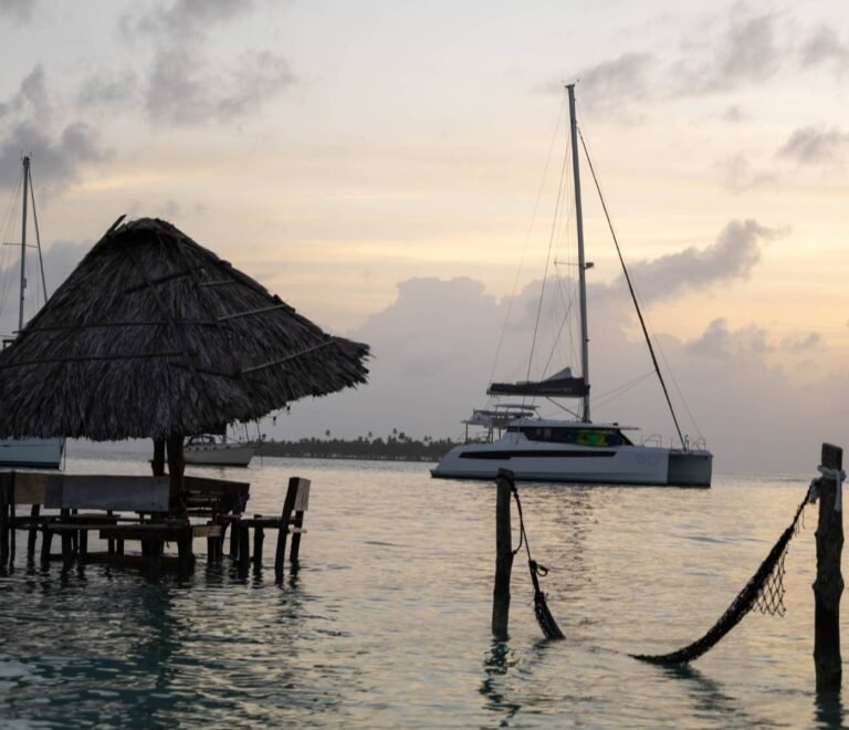 Hammock with catamaran view at sunset in Dutch Cays San Blas
