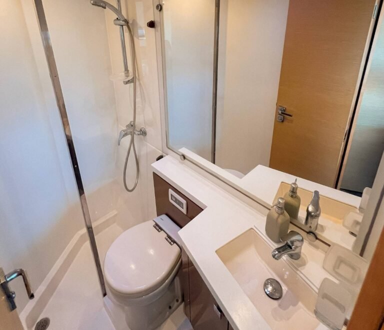 Private bathroom inside Ipanema 58 catamaran cabin in San Blas with modern shower