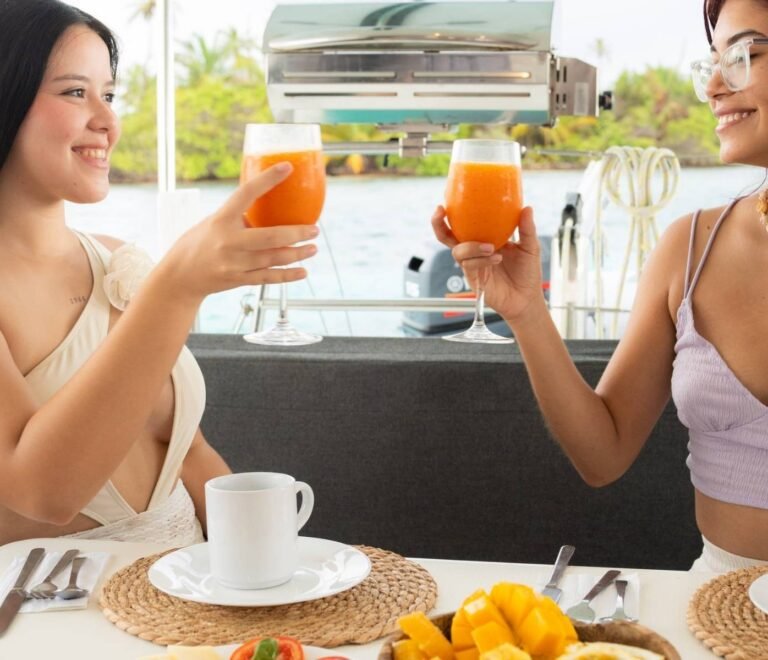Guests enjoying breakfast onboard Lagoon 40 catamaran in San Blas