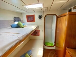 Private guest cabin inside Lagoon 55 catamaran in San Blas with double bed