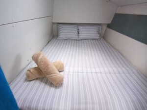 Comfortable double cabin inside Lagoon 37 catamaran in San Blas with fresh linen