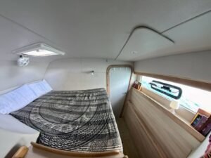 Private guest cabin onboard catamaran wellness retreat in San Blas