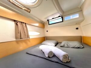 Comfortable double cabin inside Lipari 41 catamaran in San Blas with natural light