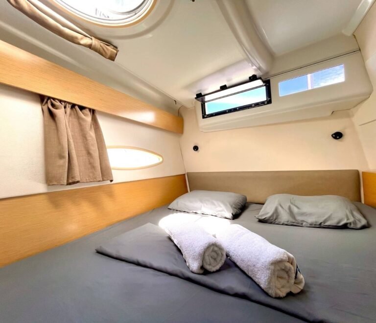Comfortable double cabin inside Lipari 41 catamaran in San Blas with natural light