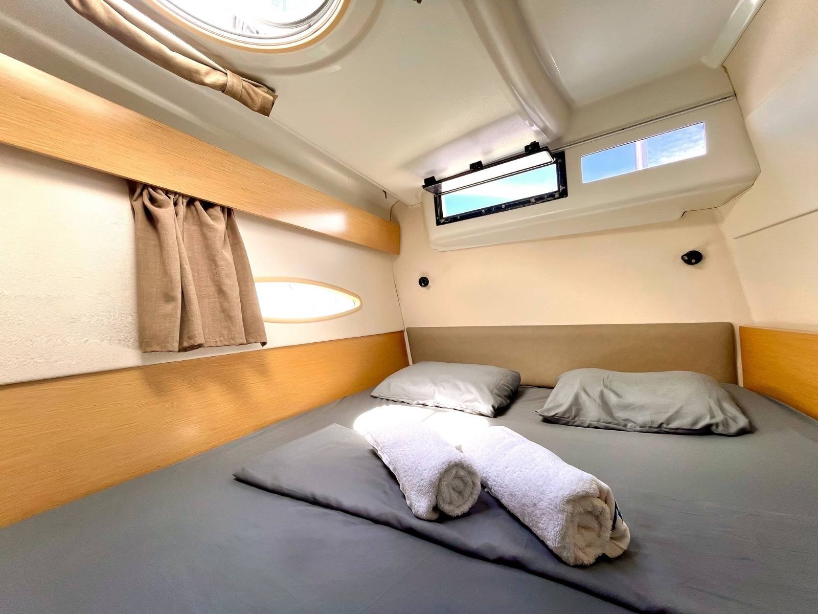 Comfortable double cabin inside Lipari 41 catamaran in San Blas with natural light