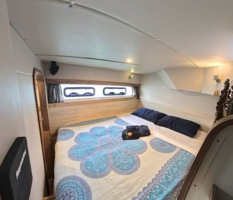 Double bed cabin onboard catamaran wellness retreat in San Blas