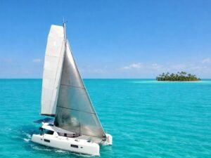 Lagoon 42 catamaran sailing in turquoise waters of San Blas Panama