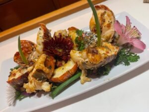 Gourmet lobster dish served onboard Lagoon 56 catamaran in San Blas