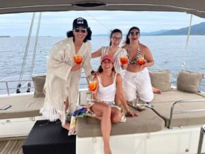 Guests enjoying cocktails onboard Lagoon 56 catamaran in San Blas