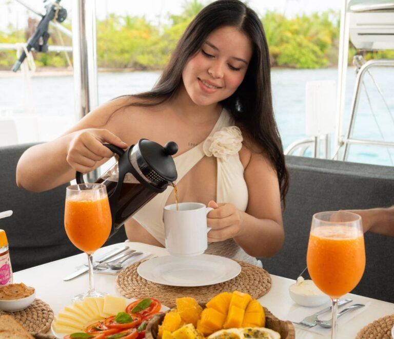 Guest enjoying breakfast onboard Lagoon 40 catamaran in San Blas