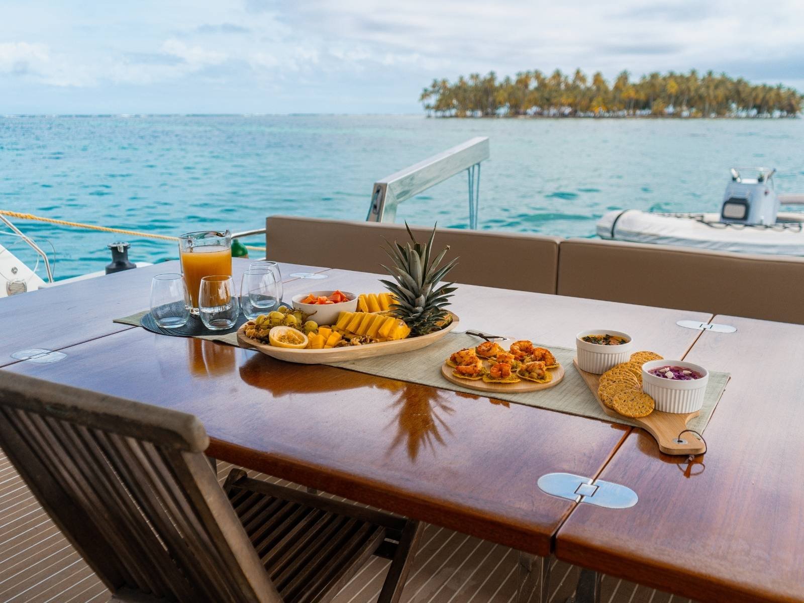 Outdoor dining table on Ipanema 58 catamaran in San Blas with ocean view