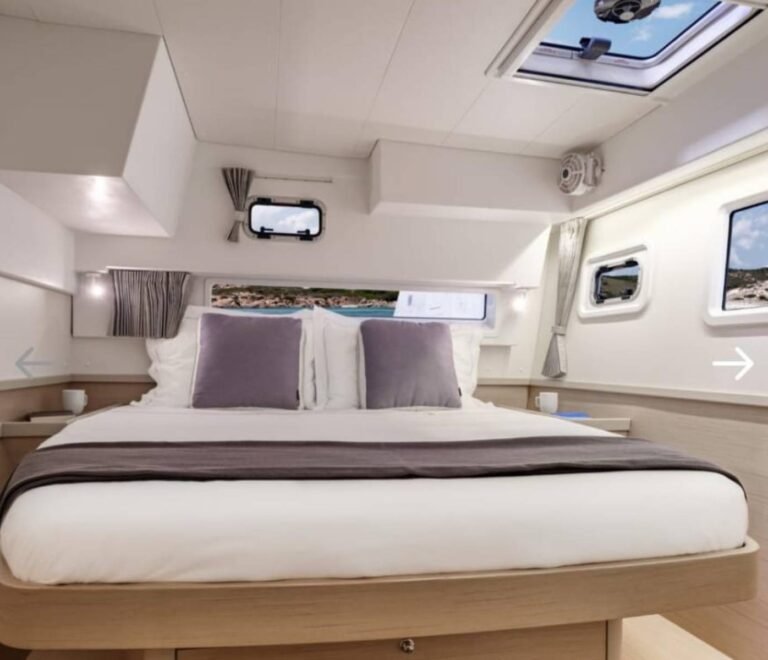 Master cabin with queen bed inside Lagoon 42 catamaran in San Blas