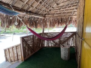 Hammock lounge inside bungalow cabin in Dutch Cays San Blas