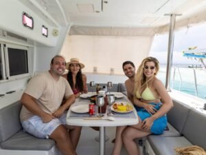 Guests enjoying lunch onboard Lagoon 440 catamaran in San Blas