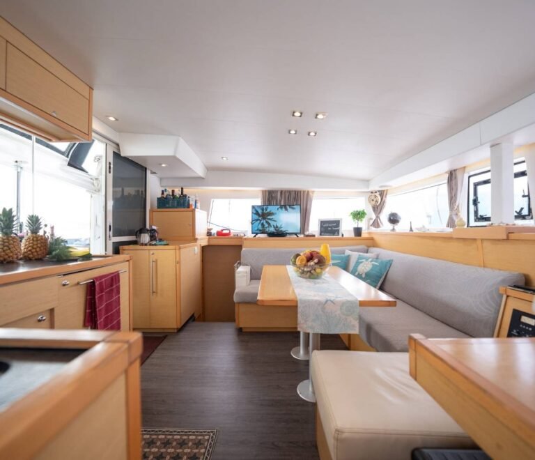 Modern interior salon and kitchen inside Lagoon 40 catamaran in San Blas