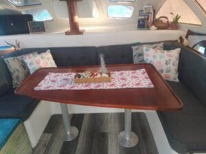 Interior dining salon inside Lagoon 37 catamaran in San Blas